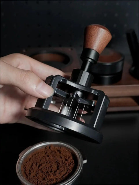 Hit The Mark Every Time With This Rock Solid 58mm Magnetic Stirrer For Espresso Portafilter Featuring Rotary Needle Distributor To Flatten Coffee Beds Smoothly and Elevate Your Home Brewing Game in use above ground coffee.