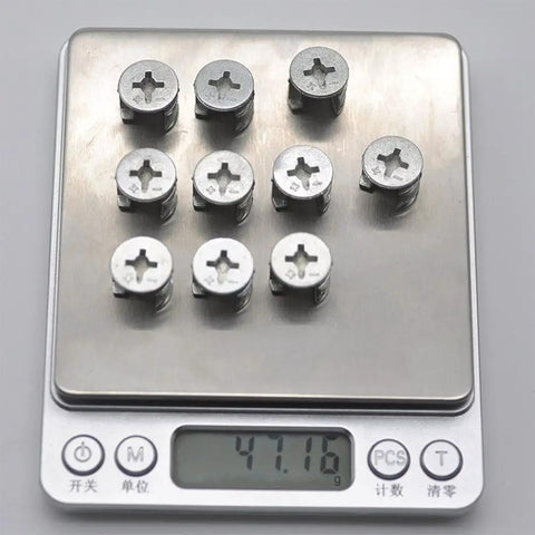 Cam Lock Fittings For Furniture Connectors Kit 20 Pack 15mm x 12mm, zinc alloy, on scale showcasing weight for cabinets drawers
