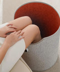 Person using Under Desk Space Heater Portable Personal Panel Heater Rollable Foot Warmer Round Warming Pad