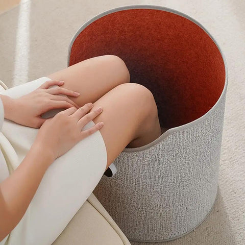 Person using Under Desk Space Heater Portable Personal Panel Heater Rollable Foot Warmer Round Warming Pad