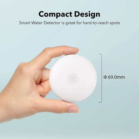 Smart Water Leak Detector 2 Pack With WiFi Alerts And 75 DB Alarm shown in hand for scale