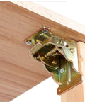 Tough As Nails Table Leg Folding Brackets 4 Pack Heavy Duty Self Locking Hinges with metal hinge mounted on wood.