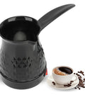 Black Electric Turkish Coffee Pot 600ml With 600W 110V Heat, ABS And Stainless Steel Turkish Coffee Maker Next to Coffee Cup