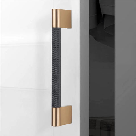 Ten Pack Knurled Cabinet Handles Center To Center Five Inch Black And Champagne Copper Kitchen Cabinet Hardware installed on door
