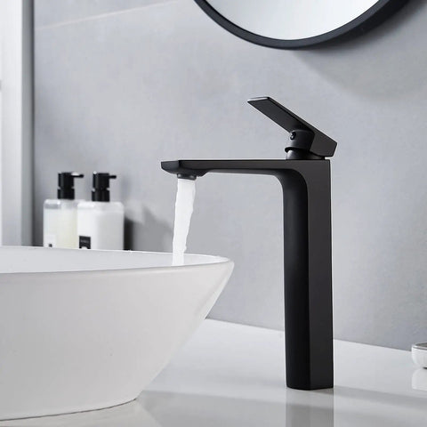 Tall Vessel Sink Faucet For Bathroom Vanity Single Hole Solid Brass Mixer 1.2 GPM with water flowing into a white basin