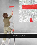 Game Changing Wall Embossing Roller For DIY Pros creating textured patterns on a painted wall by a child on a ladder.