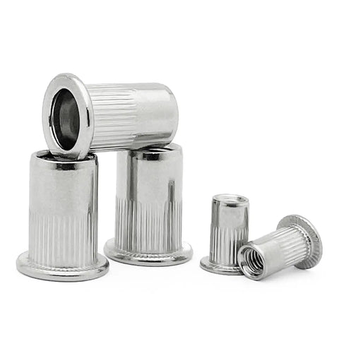 Stainless Steel Flat Head Rivet Nuts For Home DIY And Metal Work Projects Featuring Knurled Bodies stacked in various sizes.