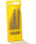 Beefy Five Piece Masonry Drill Bit Set With Razor Sharp Carbide Tips For Drilling Brick Concrete And Stone Rotary Percussion Compatible Hole Punching Kit Built Tough For Anchors Fixings And Pipe Clearances On Daily Job Sites in yellow case.