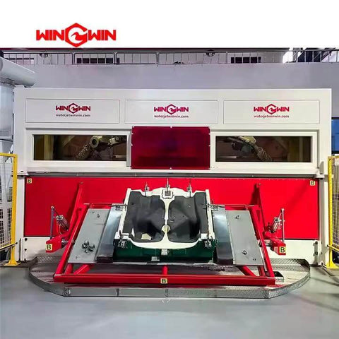 Industrial waterjet cutting system by Windwin, white and red cabinet with front clamping cradle.