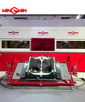 Waterjet cutting machine front view with red base, white housing, and WIN GWIN branding.