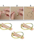 Six Piece Lynch Pin Kit With Ring Heavy Duty Seven Sixteenth Inch By One Three Quarter Inch Pins for Farm Tractors, shown in use and detail view.