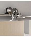 Sliding Barn Door Hardware Kit Top Mounted Dual Wheel Stainless Steel shown on installed door track system for modern farmhouse
