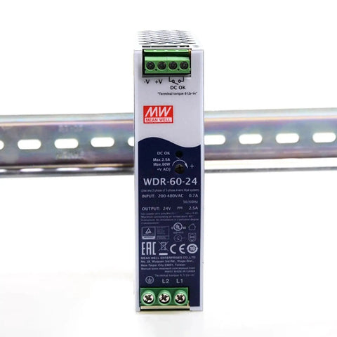 Heavy-Duty 60W 24V 2.5A Industrial Switching Power Supply With Ultra-Wide Input 180-550VAC And 254-780VDC DIN Rail Mount 4.7kV Isolation Built For Automation, Communications, And Manufacturing Equipment mounted on DIN rail
