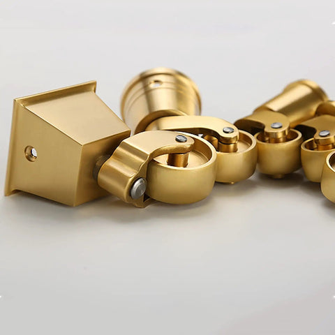 Heavy Duty Brass Caster Wheels For Furniture slick polished gold vintage casters with 360-degree swivel rotation and square cup mount.