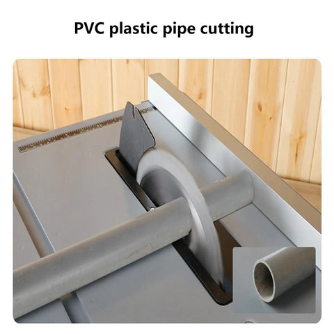 Hustle Ready 8 Inch Mini Table Saw Benchtop Miter Cutter cutting PVC pipe with a sharp blade, ideal for compact workshops.