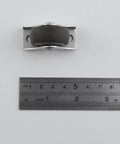 Slick Roll Mini Fixed Caster Wheels 1.26 Inch Ultra Thin Low Profile, TPE rubber with metal mount, viewed from above with ruler.
