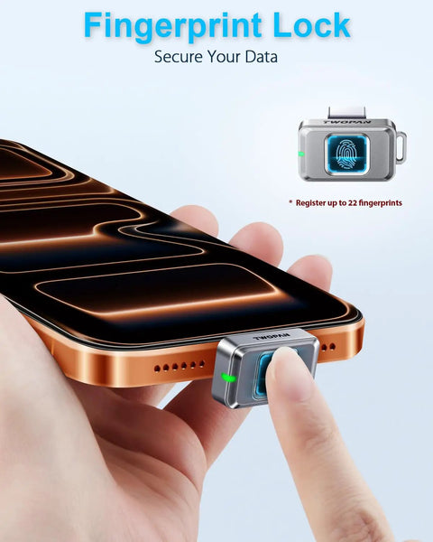 Fingerprint Nano SSD 512GB External Solid State Drive Up To Four Hundred Fifty Megabytes Per Second Pocket Sized Keychain Portable Backup For iPhone iPad MacBook Steam Deck PS5 And More attached to a smartphone with a secure fingerprint lock feature.