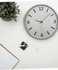 Vinyl Record Clock Replacement Parts Kit with Movements, Hands, and Long Shafts for Easy DIY Repair beside a wall clock