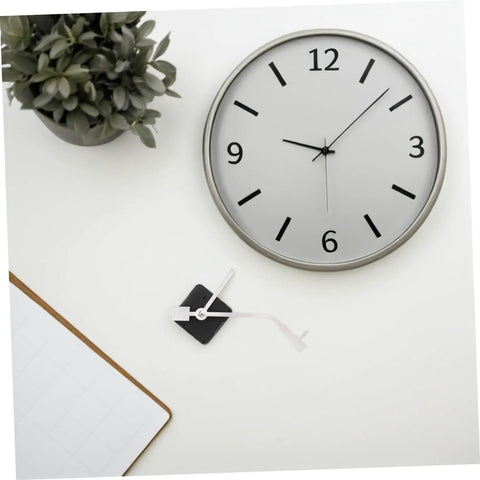 Vinyl Record Clock Replacement Parts Kit with Movements, Hands, and Long Shafts for Easy DIY Repair beside a wall clock