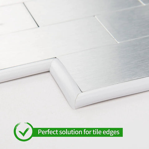 Close-up of DIY Friendly Self Adhesive Peel And Stick Trim For Walls And Borders Flexible Molding applied on tile edge.