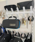 Over The Door Closet Organizer Rack With Eight Adjustable Tiers And 40 Heavy Duty Hooks holding keys, bags, and accessories