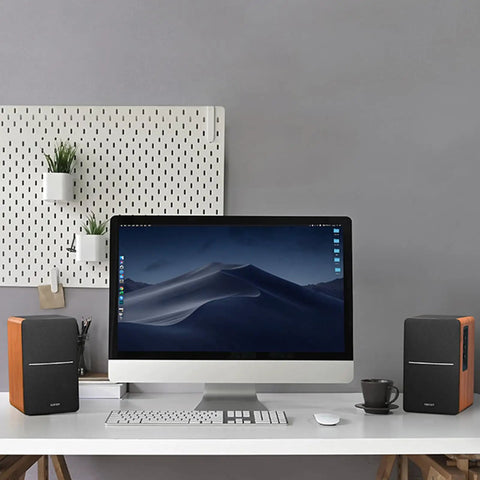 Bluetooth Bookshelf Speakers With Optical Input, Wireless Studio Monitor Vibe, 4 Inch Woofer, 42W RMS, Wood Grain Finish on desk