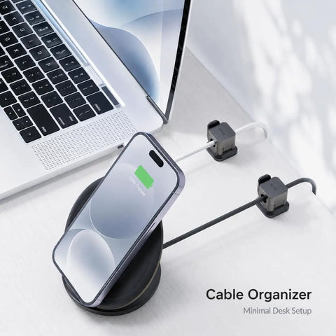 Six Pack Cable Organizer Clips with no-residue adhesive on desk setup securing USB cables beside laptop and phone
