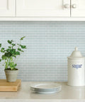 Sea Glass Peel And Stick Backsplash Tiles Blue 10.5 Inch By 10.5 Inch Four Panels Self Adhesive Easy To Install High Shine Kitchen Backsplash Look For Modern Coastal Style, behind kitchen countertop with decor.