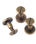 Forty Brass Flat Head Button Studs Feature Screw On Chicago Screws Ideal For Rugged Leather Belt Bag Shoes And Bookbinding Work Gives Badass Grip Quality With Slick Rust Shield Plating Comes In 5 6 5 And 8 Mm Fits, showing three flat head brass screws.