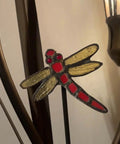 Close-up of dragonfly design on Lily Flowers And Dragonfly Tiffany Style Stained Glass Table Lamp 19 Inch Tall Handcrafted Accent Lighting