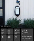 Tough Level 2 EV Charger For Home Garages With 25 Ft Cord And Standard J1772 Plug Hardwired Setup on wall with cable.