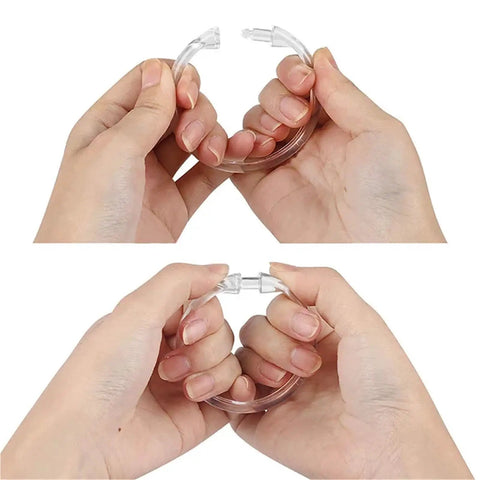 Hands holding 72 Pack Plastic Shower Curtain Rings O Shaped Hooks That Glide Smoothly On Standard Curtain Rods Durable Corrosion Resistant