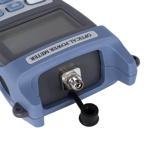 Close-up of handheld optical power meter with SC FC connector for fiber optic testing, cable tester, -70 to +10 dBm range.