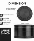 Spice grinder, front view: black aluminum 3-inch with knurled lid and dual grind plates.