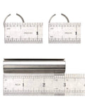 Shaft adapter sleeve, stainless steel, with two split collars and a 3-inch cylindrical sleeve; rulers for scale.