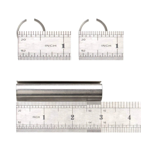 Shaft adapter sleeve, stainless steel, with two split collars and a 3-inch cylindrical sleeve; rulers for scale.