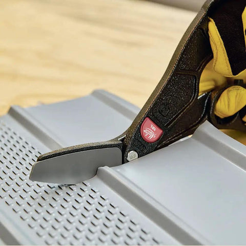 Close-up of 12 Inch Offset Aluminum Hand Snips cutting sheet metal with ergonomic grip, showcasing fast clean cuts and tight radii.