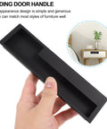Hand holding 2 Pack Invisible Embedded Alloy Wardrobe Pull Handles Matte Black Recessed Cabinet Push Pull For Home Use