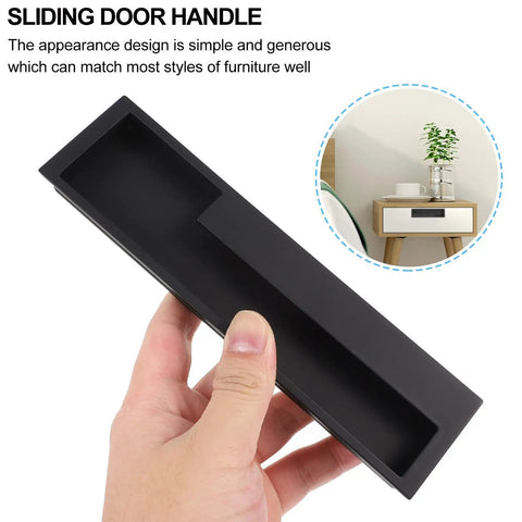 Hand holding 2 Pack Invisible Embedded Alloy Wardrobe Pull Handles Matte Black Recessed Cabinet Push Pull For Home Use