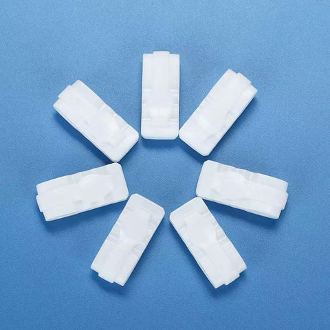 10 Pack Vacuum Bag Clips With Sliding Grip For Tight Seals arranged in a circle on blue background