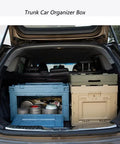 Hella Big Folding Storage Bins With Secure Lid 65L Large Collapsible Truck Bed And Car Trunk Organizer Crate in a car trunk.