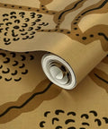 Next Level Floral Stripe Wallpaper With Glitzy Khaki Gold Metallic Details And Textured Fibrous Finish, 2ft x 27ft roll on brown background.