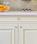 Killer Slick Brushed Nickel Cabinet Knobs and Dresser Knobs for Kitchen Bathroom Bedroom Drawer Hardware Replacement 15 Pack on white cabinets.