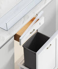 Heavy Duty Cabinet Door Protectors For Kitchen Cabinets 3/4 Inch Thick Clear Trim shown above a kitchen drawer with a trash bin.