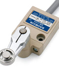 Image of waterproof SPDT micro switch with side roller plunger, sealed IP67 housing, and 3-meter pre-wired cable for CNC industrial control.