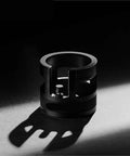 Game Changing 58mm Espresso Portafilter Station Keeps Your Gear Locked In Place During Tamping with a sturdy black metal design.
