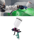 Straight Up Pro HVLP Spray Gun With Six Hundred Ml Cup And One Point Three Mm Nozzle For Dang Smooth Art Furniture Paint Projects And Zero Overspray Hassle Daily in use painting a surface.