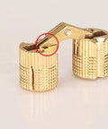 Close-up of Hidden Barrel Hinges Set Four Pack 10mm Brass Concealed Furniture Hinges With 180 Degree Opening in gold finish