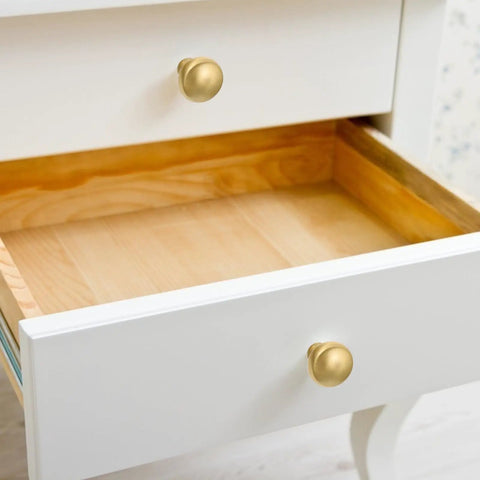 Slick Brushed Matte Brass Cabinet Handle And Drawer Pull Knob 2.8 Cm on white drawer