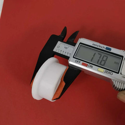 Top Gear Bearing Pulley Wheel Replacement Roller For Rowing Machine Cables measured at 178mm using calipers on red background.